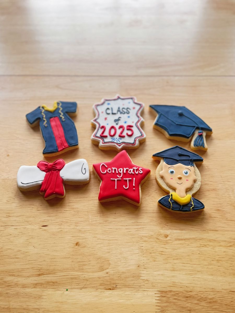 Class of 2025 graduation decorated cookies with cap, gown and diploma