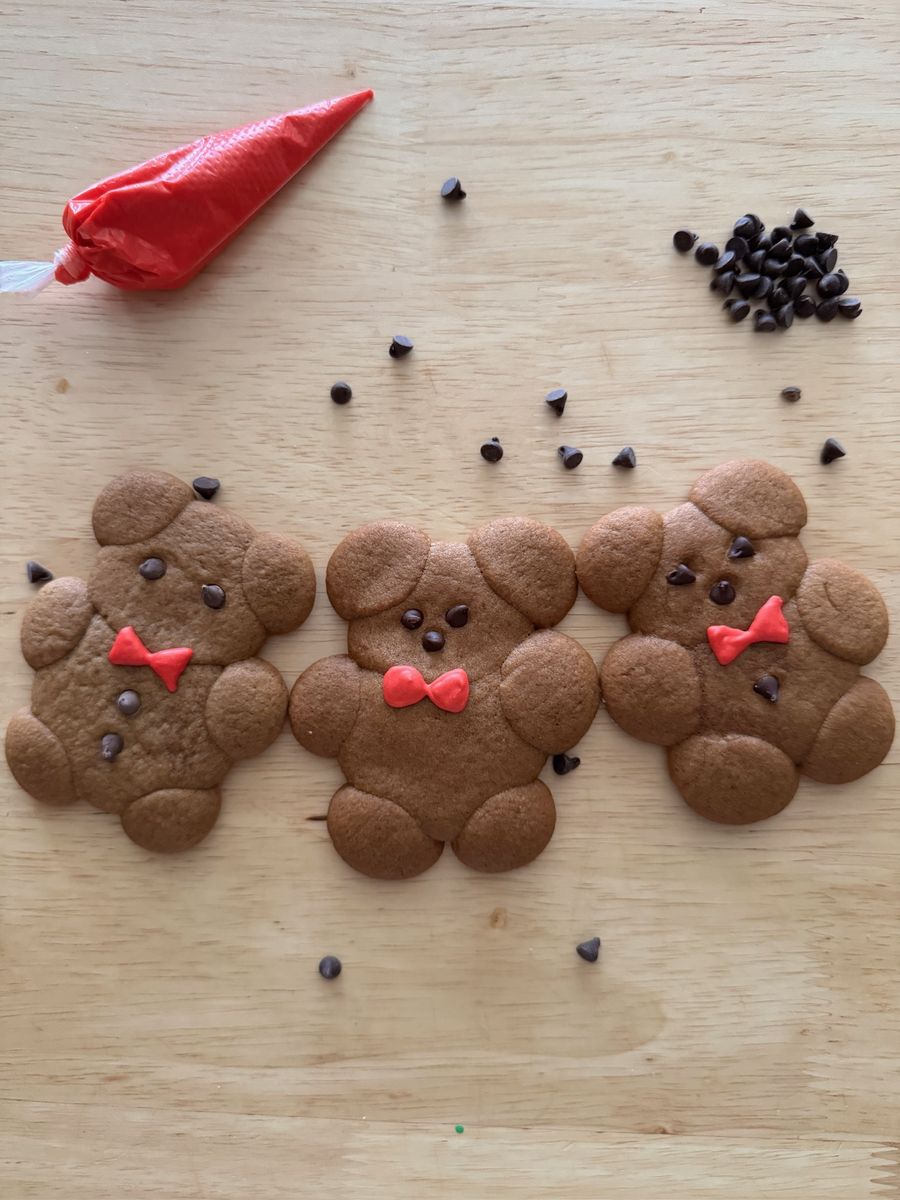 Teddy bear cookies with red icing bow ties